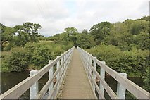 NU2304 : Footbridge crossing the River Coquet by Graham Robson