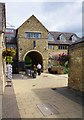 Arch at Langdale Court Shopping Centre looking towards car park, Witney, Oxon