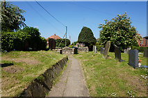 SK8594 : Graveyard at St Martin's Church, Blyton by Ian S
