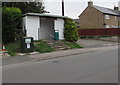 Steps up to a Dorchester Road bus shelter, Maiden Newton