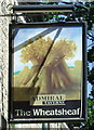 Sign for the Wheatsheaf public house, Glossop