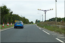 TM1227 : A120 approaching Horsley Cross roundabout by Robin Webster