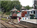 Departing Train & Signal Box at Chappel & Wakes Colne Railway Station