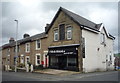 Hairdressers and houses on Cemetery Road, Darwen