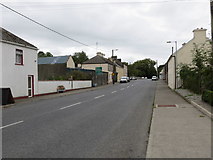 M6971 : Main Street (R360) in Ballymoe approaching its junction with the N60 by Peter Wood