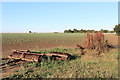 Roller beside a field