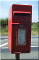 NZ1624 : Close up, Elizabeth II postbox on the A688, Evenwood Gate by JThomas