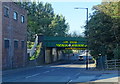 Low railway bridge over Briscoe  Lane