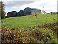 Traditional single storey farmhouse and attached hay sheds