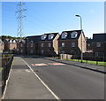 Tadia Way towards an electricity pylon, Caerleon