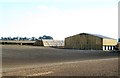 Timber clad barn above Swinton