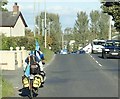 Everything bar the kitchen sink -  Heavily laden cyclists on the A25 at Camlough