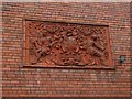 Red tile coat of arms at Dennis Ruabon Brick Works