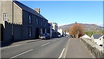 J0115 : View North along Main Street, Forkhill by Eric Jones