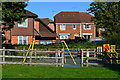 Play area and houses at Rushington