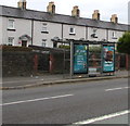 Adverts on a Neath Road bus shelter, Swansea