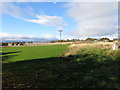 Field edge view at Maisondieu Triangulation Pillar