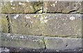 Benchmark on bridge abutment at junction of Park View and Albert Terrace