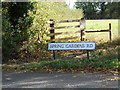 TL8929 : Spring Gardens Road sign by Geographer