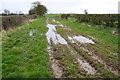 SE3388 : Muddy farm track/footpath south of Far Fairholme by Roger Templeman