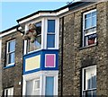 Teddy bear on a house in Waterloo Road