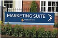 Marketing Suite sign on Tweed Street