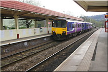 SE0623 : Passenger train departs Sowerby Bridge Station for Manchester by Roger Templeman