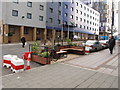 Seating in street by North Acton tube station