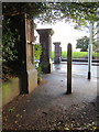 Gateposts and a bench mark in Mersey Park, Tranmere