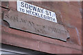 Street sign and plaque, Annan