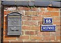 Name number and postbox on wall by pavement for Westwood/88 Dalby Road