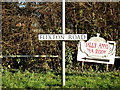 TM5097 : Flixton Road sign by Geographer