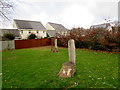 Two high-backed wooden seats on a green, Glangrwyney, Powys