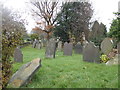 SJ3053 : Gravestones at St Paul's Churchyard, Pentre Broughton by Eirian Evans