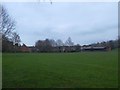 Sports field and changing rooms, by Woodbrook Way