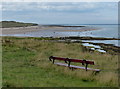 Seat overlooking the beach at Seahouses