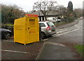 SO0428 : Yellow donations bin, Camden Road, Brecon by Jaggery