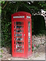 SO5219 : Book exchange in former telephone box by Colin Cheesman