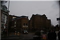 View of Kalmars and the block of flats and Coop on Tooley Street