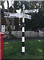 TQ6381 : Old Direction Sign - Signpost by the B188, Baker Street crossroads by Milestone Society