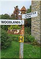 Direction Sign - Signpost at the end of Woodlands Lane in Badbury