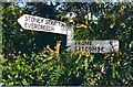 Direction Sign - Signpost opposite the war memorial in Westcombe