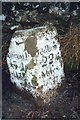 NY8497 : Old Milestone by the A68, south of Holy Trinity church, Rochester parish by C Minto