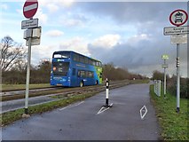 TL3469 : Guided bus crossing Fen Drayton Lakes Nature Reserve by Ruth Sharville