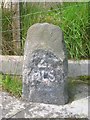 NB4235 : Old Milestone by the A857, Milestone Cottages, Newmarket, Stornoway by Milestone Society