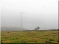 Wind turbine in low cloud