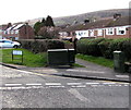 Dark green cabinets on a suburban corner in Cwmbran