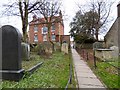 SE7983 : Graveyard and Old Vicarage by Gerald England