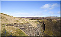 NY9937 : Western rim of Parson Byers Quarry by Trevor Littlewood
