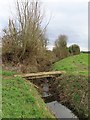 SP5111 : Footbridge over a ditch by Steve Daniels